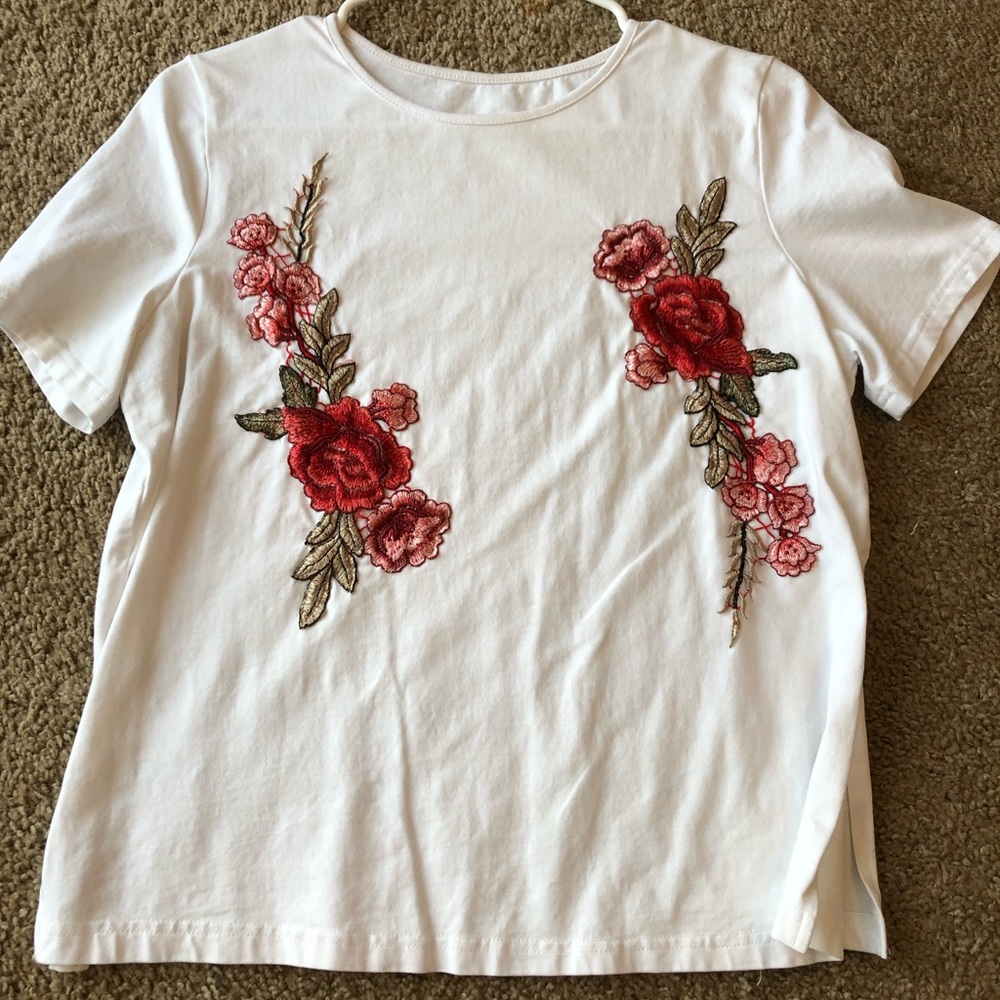 White top with floral embroidery